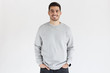 © Damir Khabirov - Young man in oversized sweatshirt, isolated on gray background