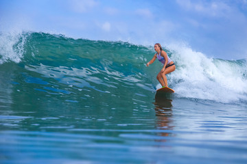 Wall Mural - Woman surfing