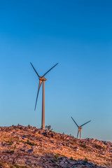 Wall Mural - View of a wind turbines on top of mountains, in Portugal