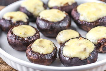 Wall Mural - Baked mushrooms stuffed with mozzarella