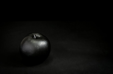 black apple on black