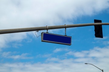 blank street sign on blue sky background 