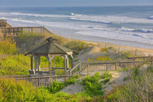 The Outer Banks In North Carolina Is A Popular Vacation Destination On The Beach.  The Homes Along The Beach Are Popular For Families Traveling To The Ocean.