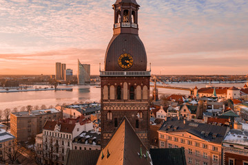 Wall Mural - Beautiful aerial winter view over Riga old town with Dome cathedral and river Daugava during sunset. Amazing Latvia.