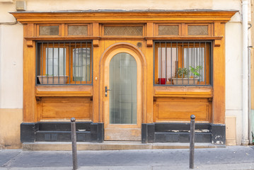 Wall Mural - Montmartre, beautiful vintage house, ancient shop in a romantic street