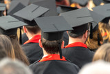 Fototapeta  - Yong student wearing graduation caps at a graduation ceremony