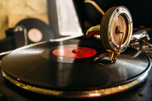 Turntable Vinyl Record Player. Retro Audio Equipment For Disc Jockey. Sound Technology For DJ To Mix & Play Music. Black Vinyl Record