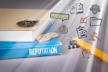 Wall Mural - Reputation concept. blue book on a gray office table. communication and information