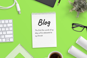 Aufkleber - Blog post text on notepad surrounded with office supplies. Green background, top view, hero, header image.