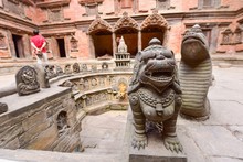Stone Guardians At Patan Royal Palace Complex In Patan Durbur Square