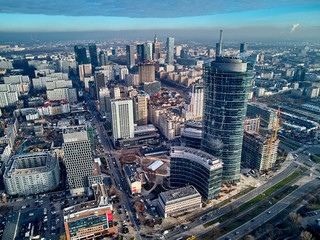 Wall Mural - WARSAW, POLAND - NOVEMBER 27, 2018: Beautiful panoramic aerial drone view to the center of Warsaw City and The Warsaw Spire - 220 metre neomodern office building on European square (Plac Europejski)