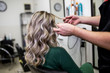 © hedgehog94 - Beautiful hairstyle of mature woman after dying hair and making highlights in hair salon.