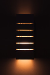 Wall light with line gaps glowing in dark