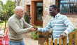 © JackF - Friendly farmers shaking hands