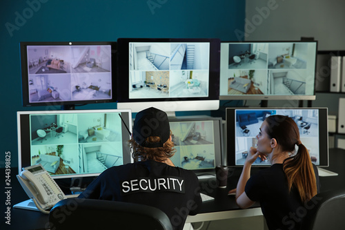 Security Guards Monitoring Modern Cctv Cameras In