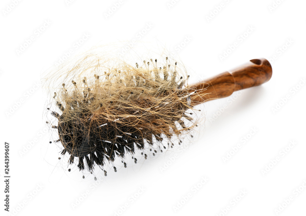 Brush with fallen down hair on white background