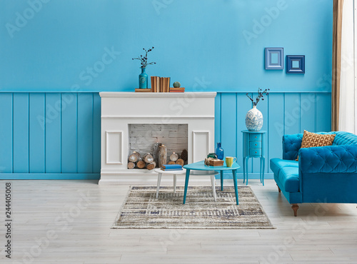 Blue Interior Room White Fireplace Blue Sofa And Middle Desk