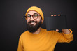 © kegfire - Bearded hipster holding tablet