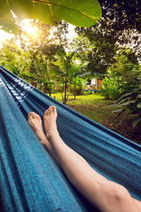 girl lying in a hammock