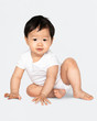 © Rawpixel.com - Baby sitting on the floor in a studio