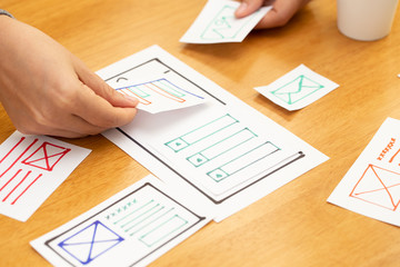 ux graphic designer creative sketch and planning prototype wireframe for web mobile phone. applicati