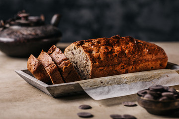 Poster - Arrangement of plate with grain bread loaf slices and served on paper 