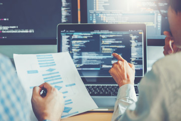 Wall Mural - developing programmer team development website design and coding technologies working in software co