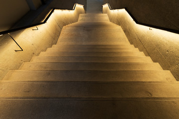 Wall Mural - illuminated old stairway in the dark