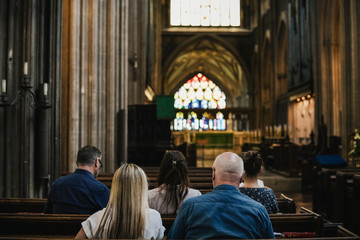 Churchgoers sitting in the pew