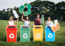 Diverse People With Colorful Recycle Bins