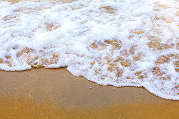 Sea waves on beach.