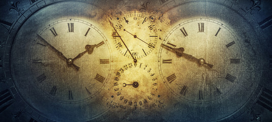 the dials of the old antique classic clocks on a vintage paper background. concept of time, history,