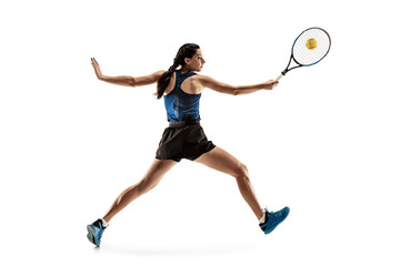 Wall Mural - Full length portrait of young woman playing tennis isolated on white background. Healthy lifestyle. The practicing, fitness, sport, exercise concept. The female model in motion or movement