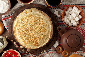 Wall Mural - Shrovetide Maslenitsa Butter Week festival meal. Stack of russian pancakes blini