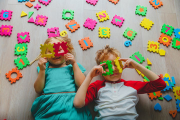 Poster - happy cute girl and boy learn numbers and shapes