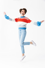 Wall Mural - Full length portrait of happy cheerful girl wearing sweater