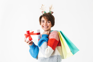 Wall Mural - Happy cheerful girl wearing sweater standing