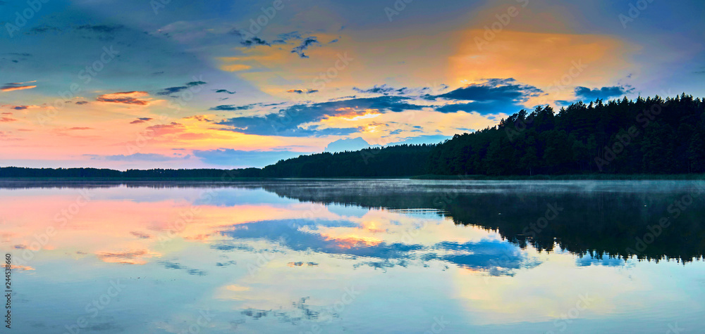 Beautiful panoramic view of the sunset over Lemiet lake in Mazury district, Poland. Fantastic travel destination. - obrazy, fototapety, plakaty 