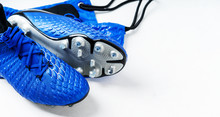 Pair Of Football Soccer Boots Cleats Shoes On A White Background. Frame Football Theme Long Wide Banner With Copy Space Background.