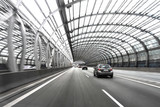Fototapeta Miasto - Expressway in Warsaw. Glass tunnel on the highway