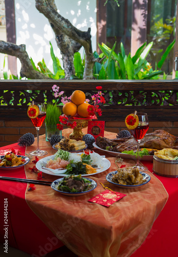 Chinese New Year Party Table In Red And Gold Theme With Food