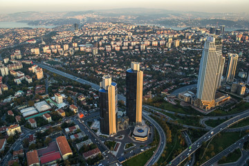 Wall Mural - ISTANBUL, TURKEY - AUGUST 23: Skyscrapers and modern office buildings at Levent District. With Bosphorus background. August 23, 2014 in Istanbul, Turkey.