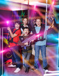 © JackF - Group portrait of happy teenagers with laser guns having fun on