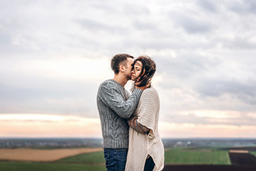 Romantic young couple spending time together outdoor.