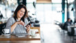 © Etoilestars - Business woman using smartphone