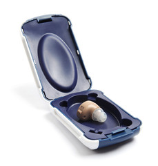 Case with hearing aid on white background