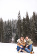 © New Africa - Couple spending time outdoors on snowy day, space for text. Winter vacation