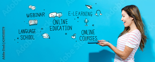 Online education theme with young woman using her tablet Fototapet