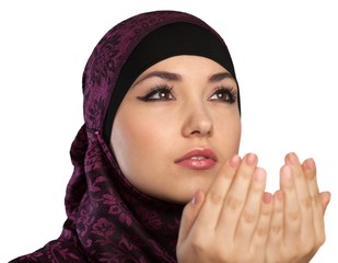 Wall Mural - young muslim woman praying