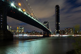 Fototapeta  - View of the Manhattan Bridge and Manhattan from the riverside of the East River at night - 1